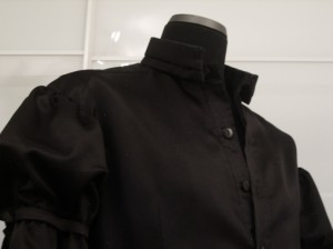 The Black Shirt, open collar