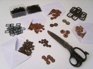Yesteryear's overstock, with hooks, clasps, shears and a lot of buttons.