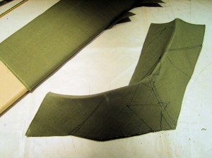 Flax-fiber collar interfacing, created in two full-bias layers, one a single piece, the other a patchwork of remnants.